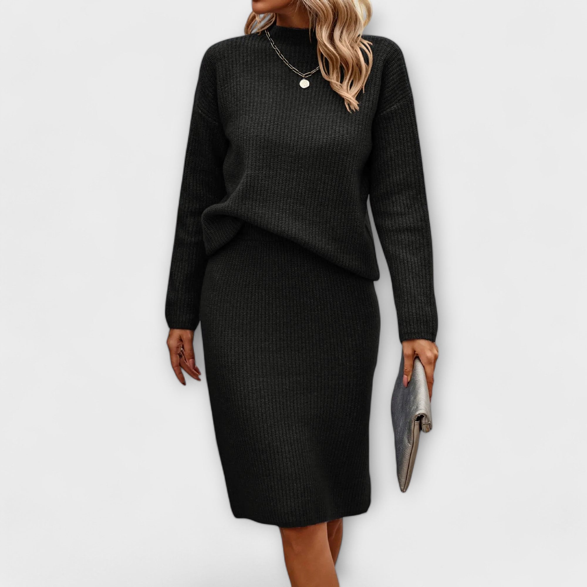 Completo di maglione e gonna a due pezzi